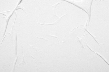Abstract background of white paper with folds.