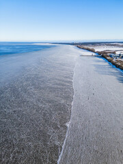 Vertical Aerial View of Ice and Open Water at Greifswalder Bodden with Lubmin in the Distance