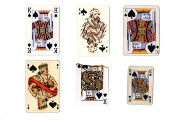 A vintage king of spades playing card in six different designs.