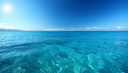crystal clear blue sea water rippling under soft sunlight creating a sense of serenity and open space perfect for travel and nature designs