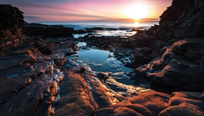 Coastal Landscape with Tide Pools Reflecting Sunset Sky