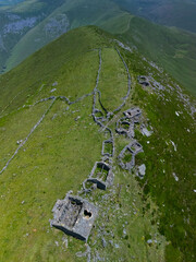 A group of ruined Pasiegan cabins located near Yera, called Caba&ntilde;al "La Marrulla," at an altitude of 1,380 meters. Vega de Pas Municipality, Pasiegan Valleys, Cantabria, Spain, Europe
