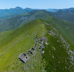 A group of ruined Pasiegan cabins located near Yera, called Caba&ntilde;al "La Marrulla," at an altitude of 1,380 meters. Vega de Pas Municipality, Pasiegan Valleys, Cantabria, Spain, Europe