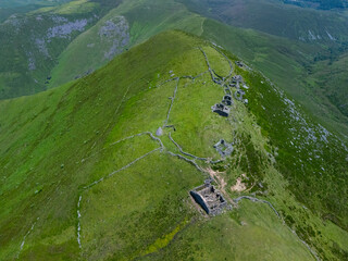 A group of ruined Pasiegan cabins located near Yera, called Caba&ntilde;al "La Marrulla," at an altitude of 1,380 meters. Vega de Pas Municipality, Pasiegan Valleys, Cantabria, Spain, Europe