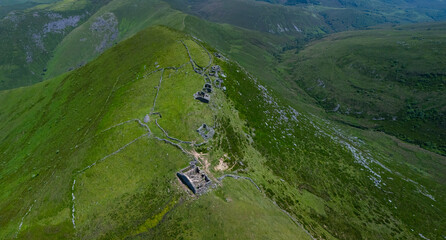 A group of ruined Pasiegan cabins located near Yera, called Caba&ntilde;al "La Marrulla," at an altitude of 1,380 meters. Vega de Pas Municipality, Pasiegan Valleys, Cantabria, Spain, Europe