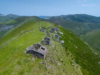 A group of ruined Pasiegan cabins located near Yera, called Caba&ntilde;al "La Marrulla," at an altitude of 1,380 meters. Vega de Pas Municipality, Pasiegan Valleys, Cantabria, Spain, Europe