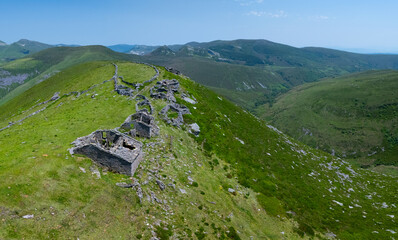 A group of ruined Pasiegan cabins located near Yera, called Caba&ntilde;al "La Marrulla," at an altitude of 1,380 meters. Vega de Pas Municipality, Pasiegan Valleys, Cantabria, Spain, Europe
