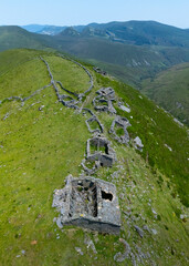 A group of ruined Pasiegan cabins located near Yera, called Caba&ntilde;al "La Marrulla," at an altitude of 1,380 meters. Vega de Pas Municipality, Pasiegan Valleys, Cantabria, Spain, Europe