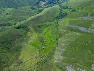 A group of ruined Pasiegan huts located near Yera. Vega de Pas Municipality. Pasiegan Valleys. Cantabria. Spain. Europe