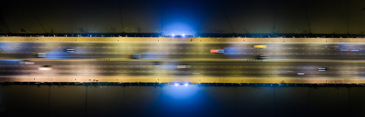 Expressway, Self-driving autonomous electric cars of the future with elements move along a busy traffic intersection. Artificial Intelligence, Car Scan, GPS Tracking, Smart Roads, IoT, highway