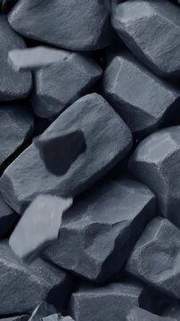 Dark grey shale breaking apart and falling with dust for rockfall simulation animation Vertical video