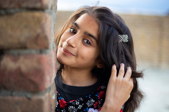 Cute Malalai Jan, a Pashtun Girl indoor natural shots.