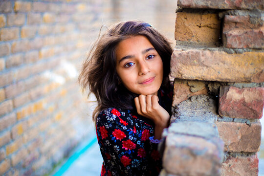 Cute Malalai Jan, a Pashtun Girl indoor natural shots.
