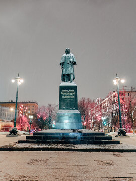 monument to Nikolai Vasilievich Gogol, the renowned Russian writer, located in Moscow. The statue stands on a multi-tiered pedestal made of dark granite.