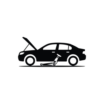 Silhouette of a car with an open hood and a wrench beside it