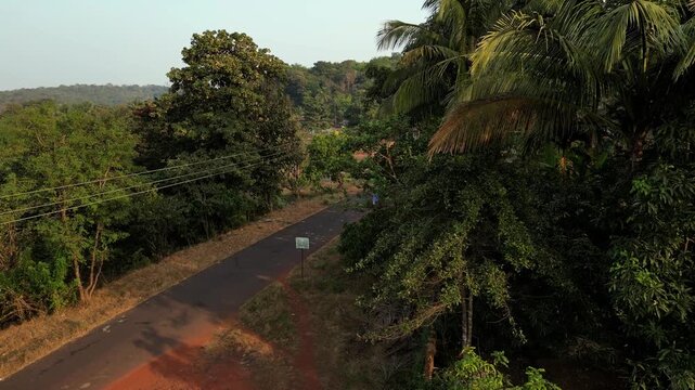 Beautiful ariel crane up view of village revealing view. 