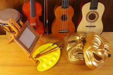Art attributes. Music, theater, and painting.