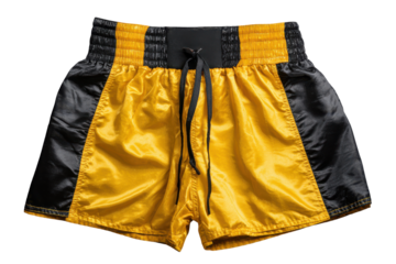 Golden and black muay thai boxing shorts isolated on transparent background. Gold and black boxing shorts for martial arts training isolated on white background.