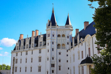 Majestic Castle of Nantes - Ch&acirc;teau des ducs de Bretagne standing tall in summer sunlight of Nantes, France.