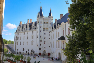 Exploring the beauty of Nantes in a vibrant summer scene. The Castle of Nantes - Ch&acirc;teau des ducs de Bretagne, France.
