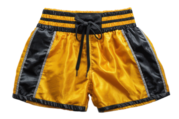 Yellow and black muay thai boxing shorts isolated on transparent background. Boxing shorts for athletic competition and training isolated on white background.