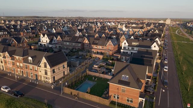 Aerial view of  Weespersluis neighbourhood in the city of Weesp, new city district with modern homes