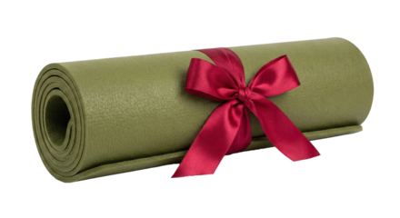 A rolled green exercise mat tied with a red ribbon, transparent background