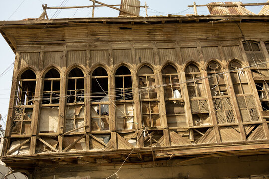 Basrah, iraq - February 15, 2023: photo of balconies and windows of  historic houses in basra city