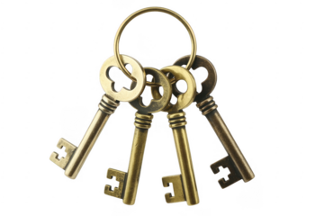 Bunch of old metal keys keyring isolated on a transparent background