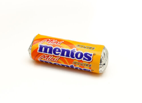 Orange mentos mini pack of gums isolated on white background