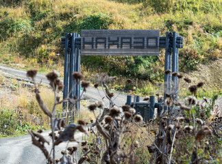 Gates of camping site Nakhazo in Rosa Khutor resort in Krasnaya Polyana. Not AI