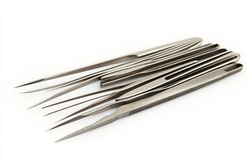 Set of stainless steel tweezers on white background for precision tasks