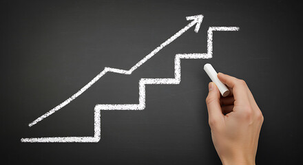 Hand drawing white chalk growth chart on blackboard