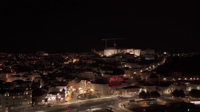 Coimbra City Lights at Night. Mondego River and University Hill, Aerial