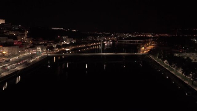 Coimbra from Above at Night. Mondego River, Roads and Streets on Both Sides, Aerial