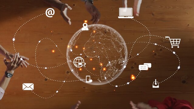Hands surround a globe displaying digital icons that symbolize global communication and technology. This image represents teamwork and innovation in a connected world. Raster - Powered by Adobe