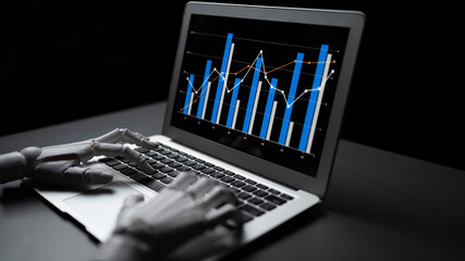 Robotic hand engages with a laptop screen showing analytics graphs in a sleek dark setting, symbolizing the fusion of technology and data-driven decisions. Scalp
