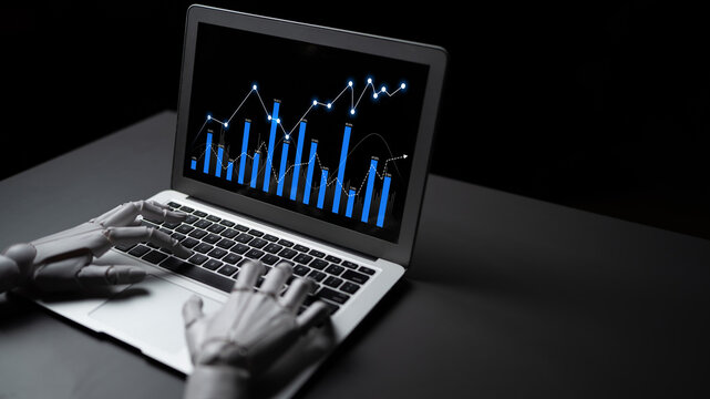 A robotic hand interacts with a laptop showing data visualizations and charts, portraying the intersection of technology and analytics in modern business systems. Scalp - Powered by Adobe