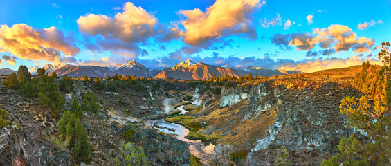 Panorama of Snowy Sierra Mountains River and Sunrise Over Rugged Eastern California