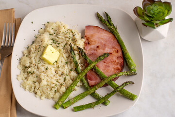 ham with asparagus and mash pot top with herbs