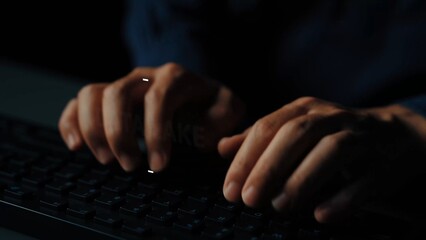 Close-Up of Hands Typing on a Black Keyboard in a Dimly Lit Room, Emphasizing Focus and Productivity. Asymptotic smart data analytic.