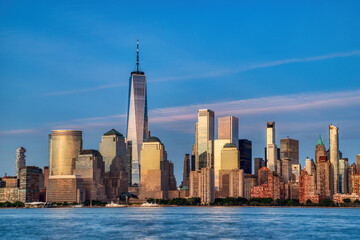 Fototapeta premium Illuminated New York City Skyline View at Dusk, New York