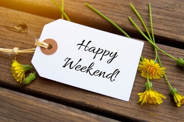 Naklejka premium White Banner with the Words Happy Weekend on it and many yellow Flowers.