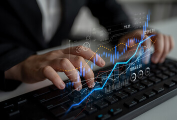 A businessman analyzes data using a keyboard in a modern office, with digital graphs and charts overlaid, showcasing insights and trends for strategic decisions. Scalp