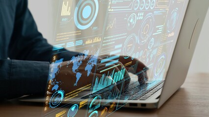 A businessman works on a laptop in a modern office, surrounded by a digital interface showcasing data analysis and statistics, highlighting technology in remote work. Cipher