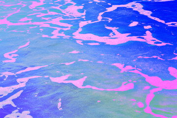 Obraz premium Neon Purple and Pink Water Surface Abstract Texture