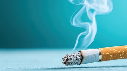 A close-up shot of a cigarette on a vibrant blue surface, featuring wisps of smoke rising into the air, conveying a sense of calm and contemplation.