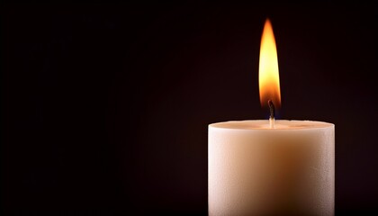 Burning Candle On Dark Background