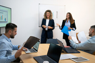 Business professionals collaborating at a meeting in the office