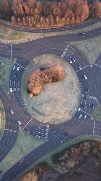 Drone View of Vehicles Moving Through Roundabout in Basingstoke, England, UK